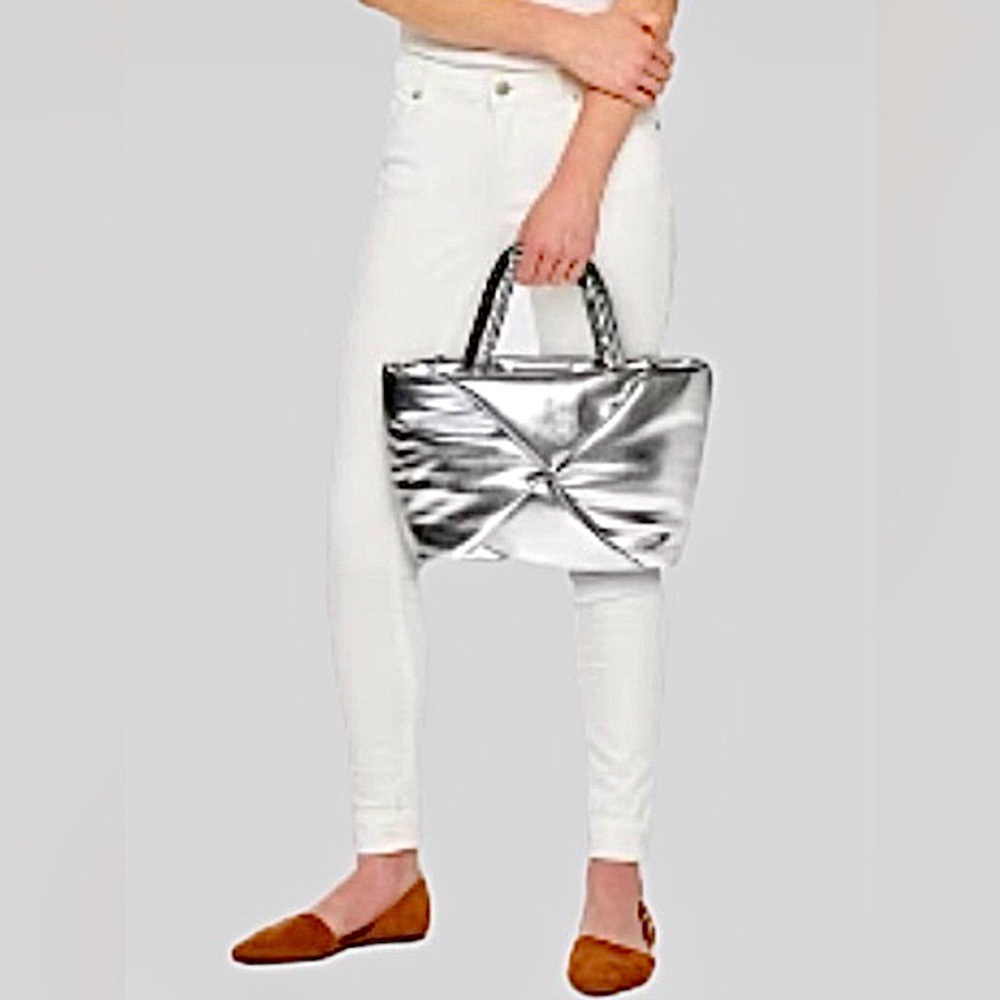 new day | Women’s silver puffer purse, front knot, single interior pocket